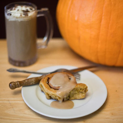 Pumpkin Cinnamon Rolls with Salted Caramel Whisky Drizzle